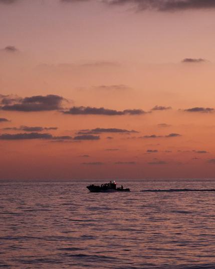 so-called Libyan coast guard vessel intercepting illegaly a boat in distress at sea