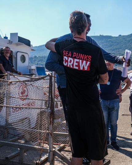 Fairwell to a rescued survivor disembarking Sea Punk I