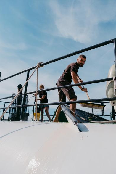 crew cleaning deck on Sea Punk I