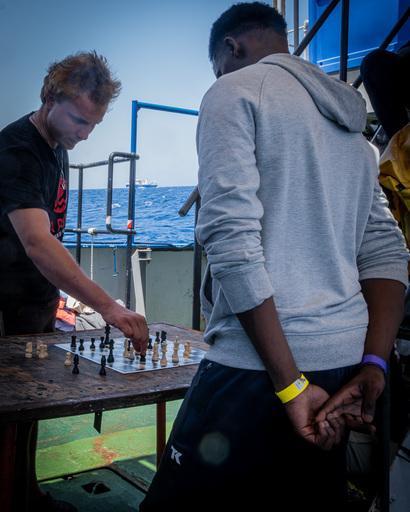 chess play on board Sea Punk I