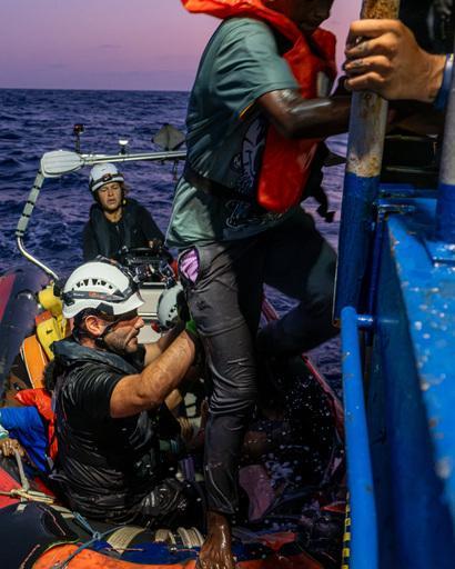 a person in distress at sea is embarked to Sea Punk I by RHIB Crew